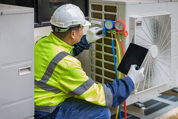Professional Ductwork Repair technician working in Grafton, MA